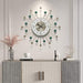 Decorative wall clock with green accents on a wall above a console table.