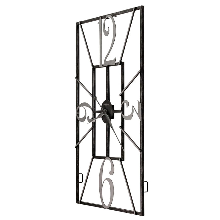 Decorative wall clock with black metal frame and silver numbers on a white background