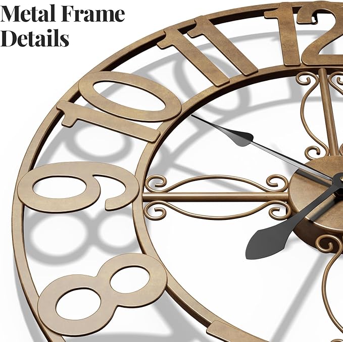 Close-up of a gold metal antique wall clock with detailed frame and black hands.