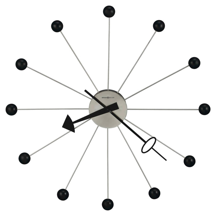 Modern wall clock with black and white design on a white background