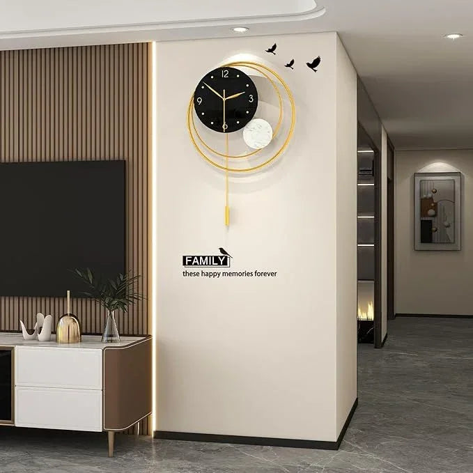 Decorative wall clock with gold frame and black face on a white wall in a modern interior setting.