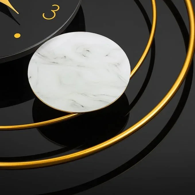 Marble coaster on a black surface with gold accents