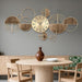 Decorative wall clock with geometric design in a dining room setting