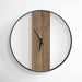 Wooden wall clock with black frame on a white background