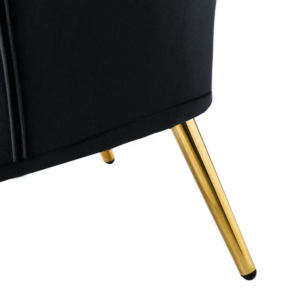 black lounge chair gold legs