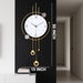 Decorative wall clock with gold accents on a black background, showing dimensions.