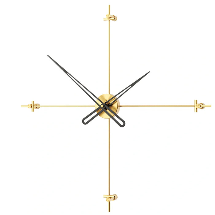 Modern wall clock with gold frame and black hands on a white background