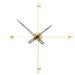Modern wall clock with gold frame and black hands on a white background