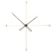 Minimalist wall clock with gold and black design on a white background