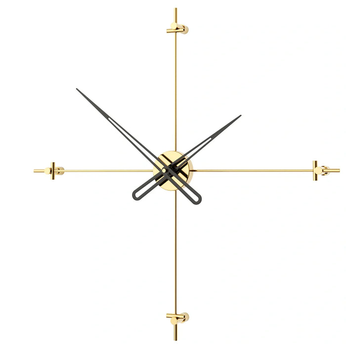 Modern wall clock with gold frame and black hands on a white background