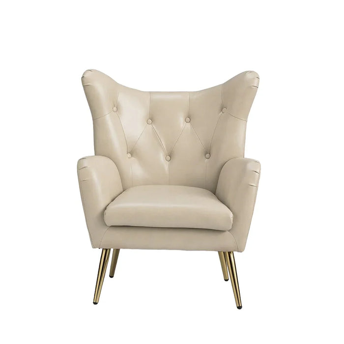 cream accent chair with gold legs on a white background