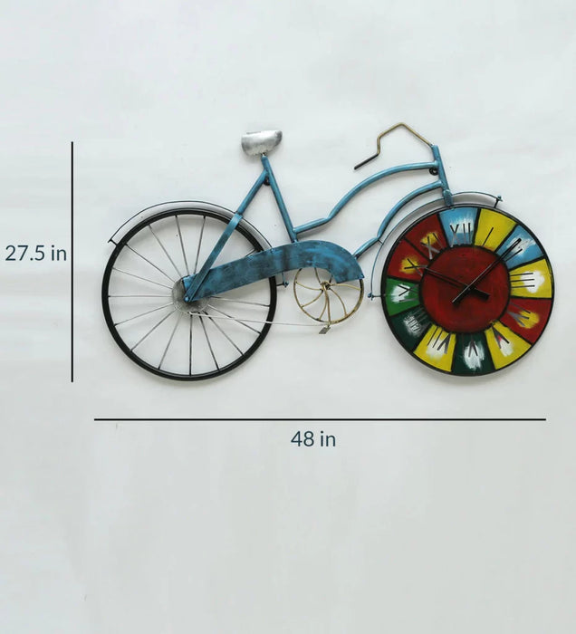Bicycle-shaped wall clock with measurements on a white background