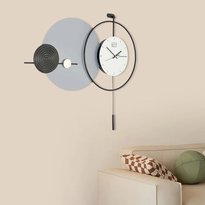 Modern wall clock with decorative elements on a beige wall