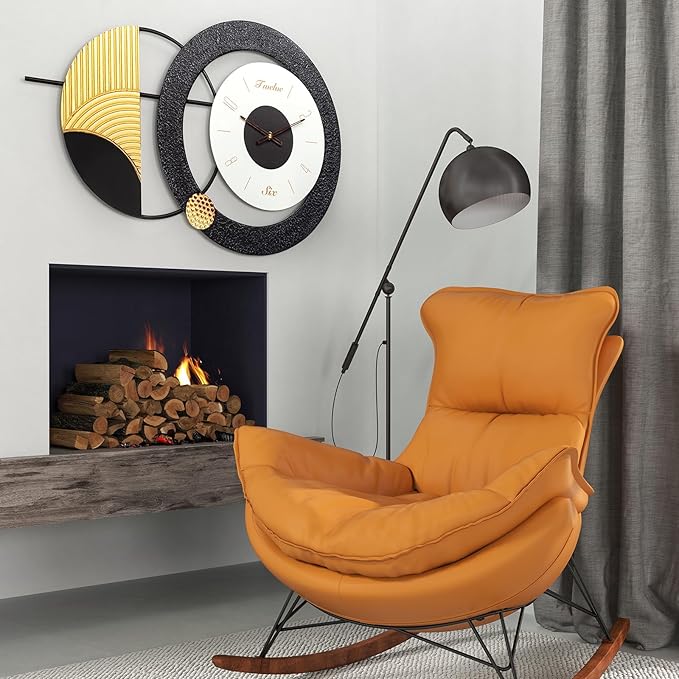 Orange chair in a living room with a fireplace, wall clock, and floor lamp.