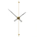 Modern wall clock with gold and black design on a white background