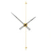 Modern wall clock with gold and black design on a white background