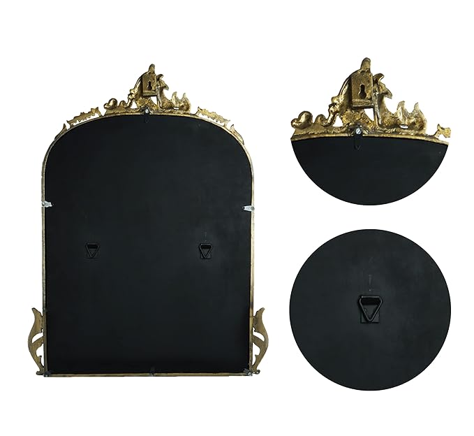 Decorative black mirror with gold embellishments on a white background