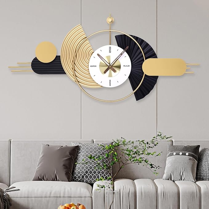Decorative wall clock with geometric design on a gray wall above a sofa.