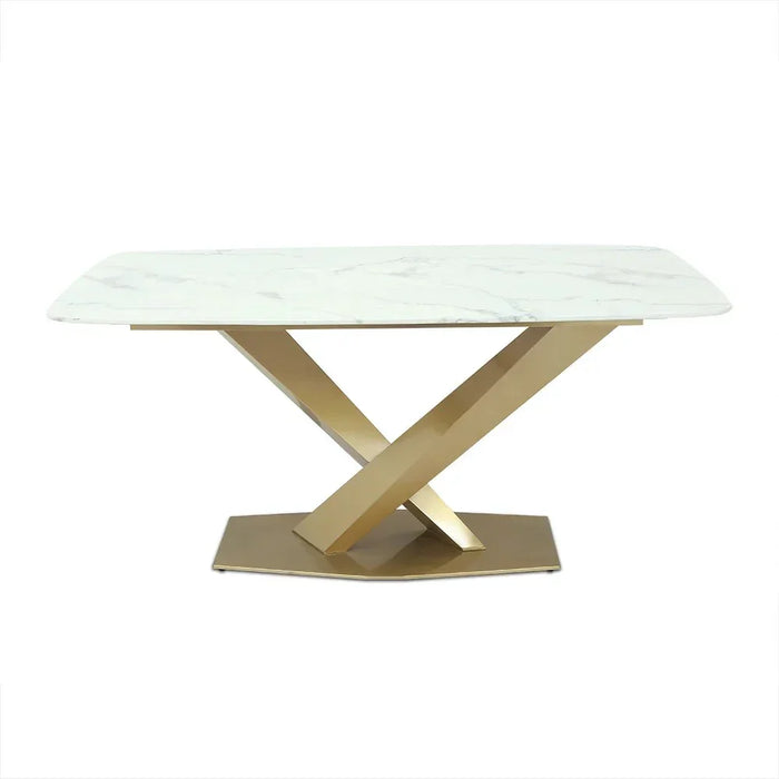 Table with marble top and gold metal base on a white background