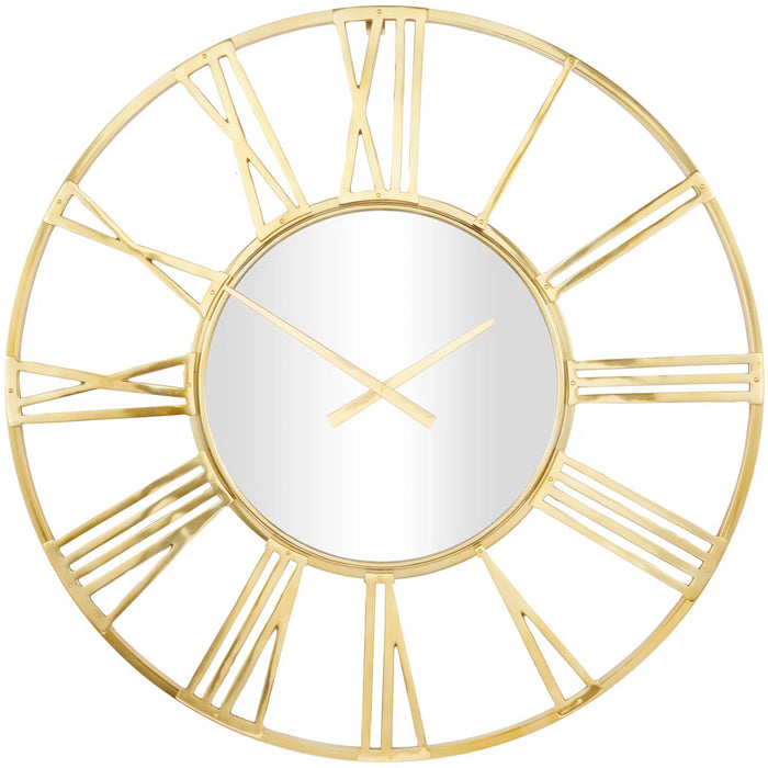 Gold wall clock with Roman numeral design on a white background