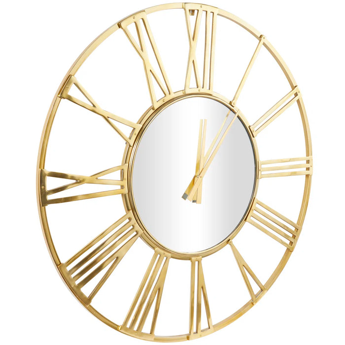 Gold wall clock with Roman numeral design on a white background