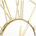 Gold oversized wall clock with geometric design on a white background
