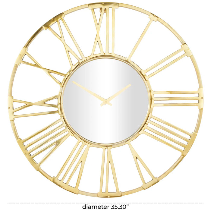 Gold oversized wall clock with Roman numeral design on a white background