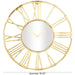 Gold oversized wall clock with Roman numeral design on a white background