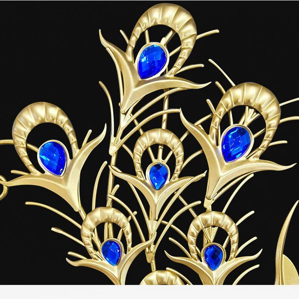 Gold brooch with blue gemstones on a black background