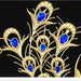 Gold brooch with blue gemstones on a black background