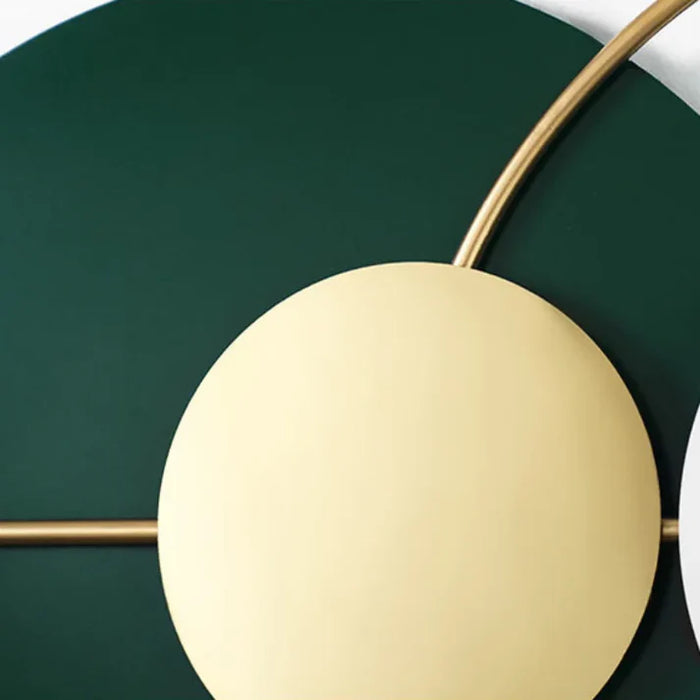 Gold circular object on a green background