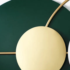 Gold circular object on a green background