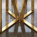 Gold metal chair leg on a reflective surface