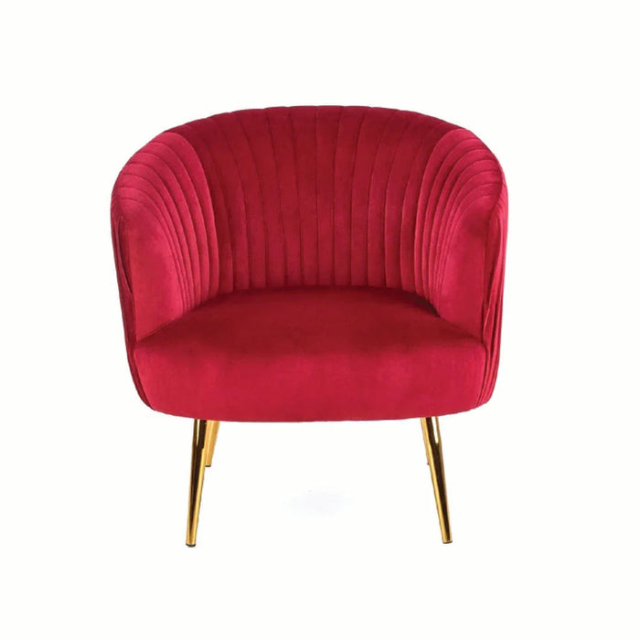 Maroon velvet armchair with gold legs on a white background