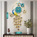 Decorative wall clock with peacock design on a wall