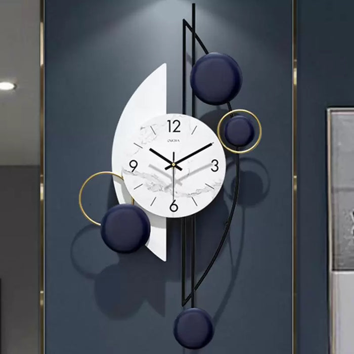 Modern wall clock with decorative elements on a dark background
