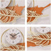 orange leaf metal wall clock