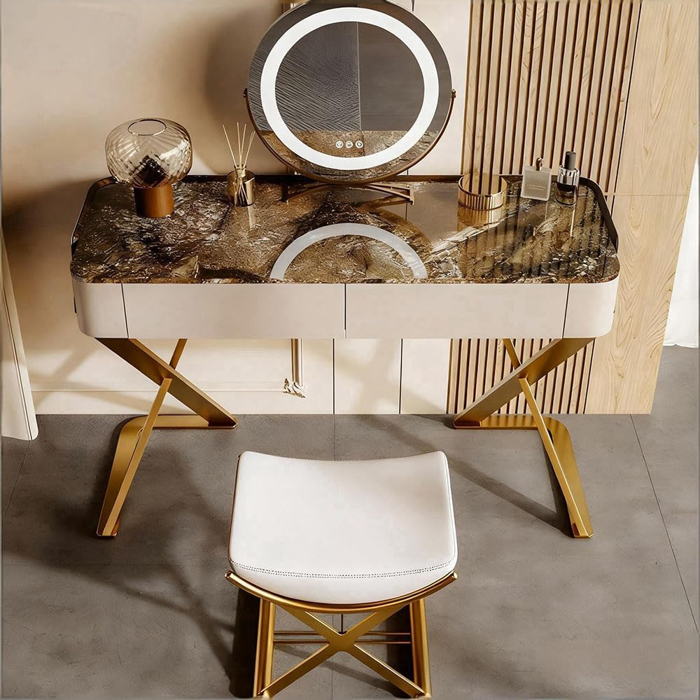 Modern vanity table with marble top and round mirror in a stylish room.
