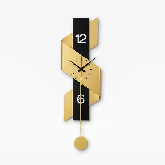 Modern wall clock with gold and black design on a white background
