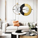 Modern living room with a decorative wall clock and stylish furniture.