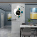 Modern wall clock with decorative elements in a stylish room setting.