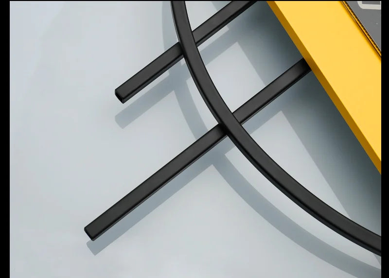 Close-up of a black metal rod on a light gray background