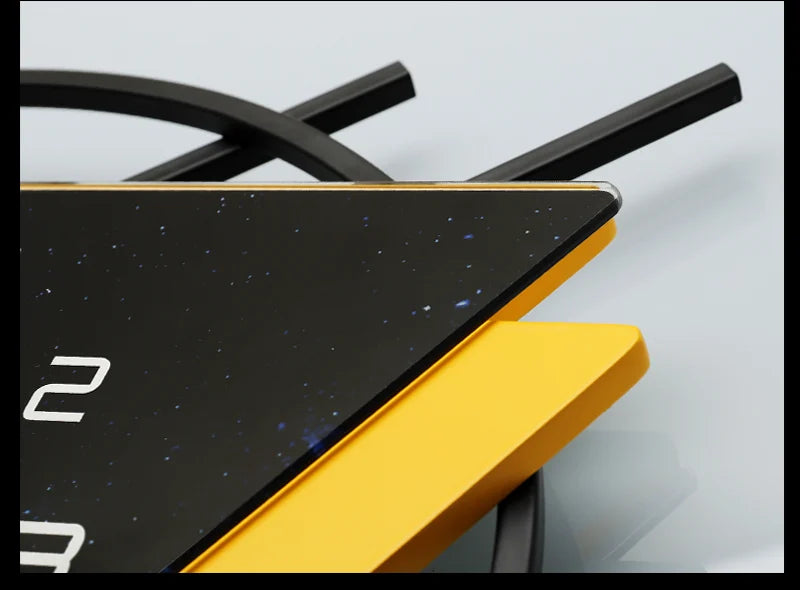 Close-up of a car spoiler with black and yellow colors on a light gray background