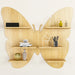 Wooden butterfly shelf with decorative items on a white background