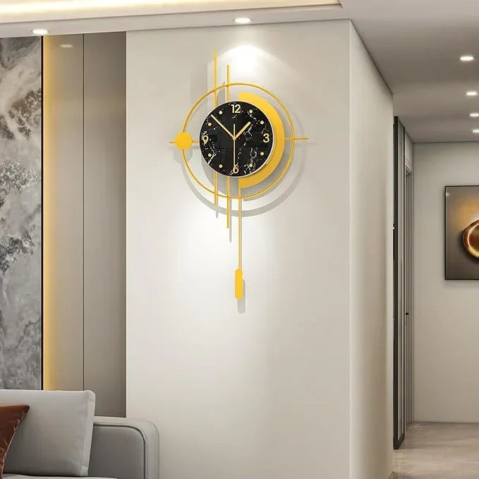 Decorative wall clock with yellow accents on a modern interior wall.