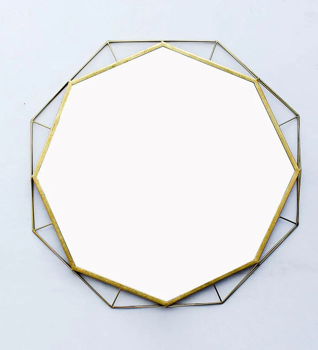 Abstract wall mirror in golden colour