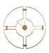 Gold metal wall clock with geometric design on a white background