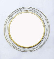 Round wall mirror in golden colour - All India Decor