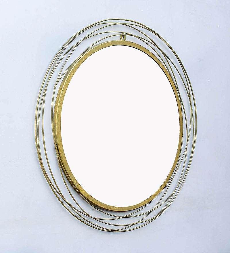 Round wall mirror in golden colour - All India Decor