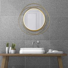 Round wall mirror in golden colour - All India Decor